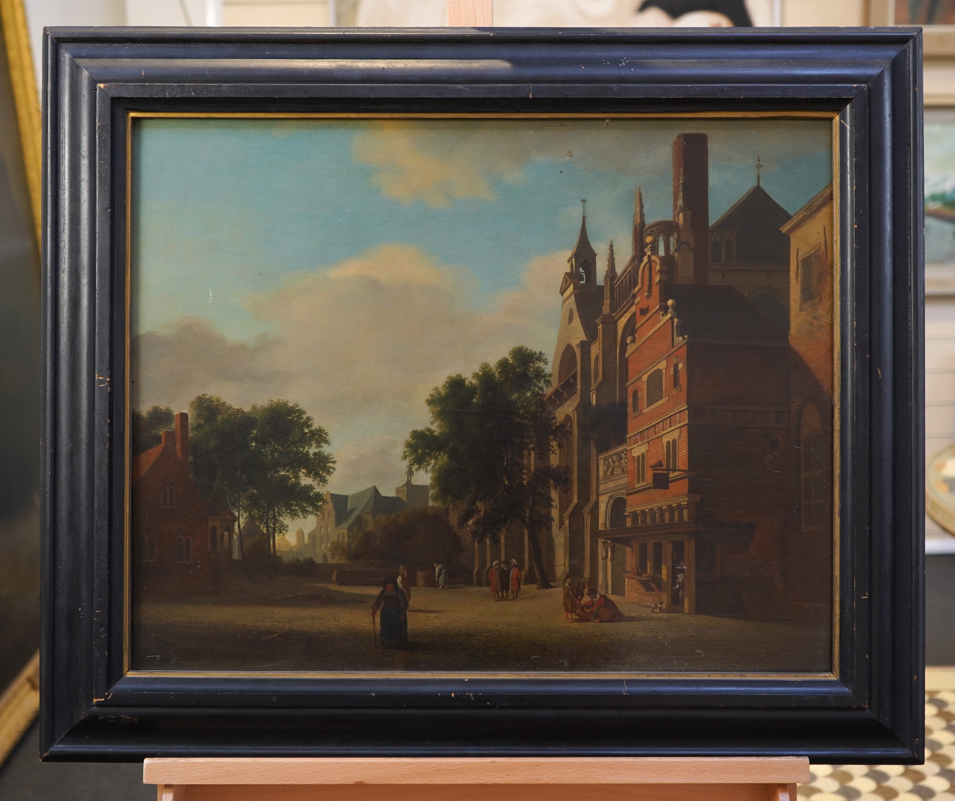 After Jan Van Der Heyden, Dutch (1637-1712), 'Square with a Cobbler's Shop and a Gothic Church'
